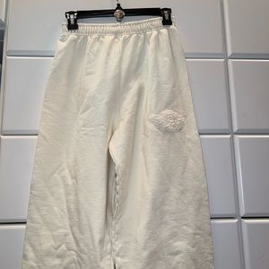 Boys lie cuffed sweatpants